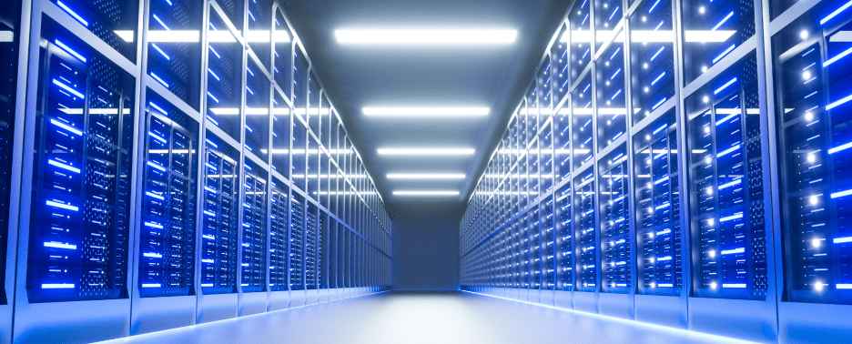 A long hallway lined with rows of servers, showcasing a modern data center environment.